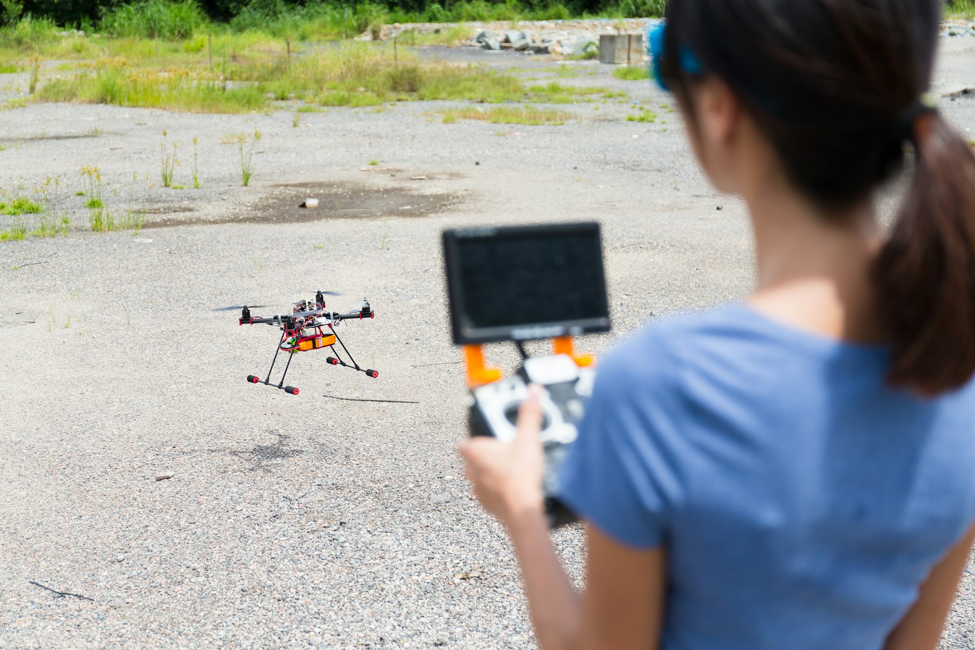 Woman playing with drone